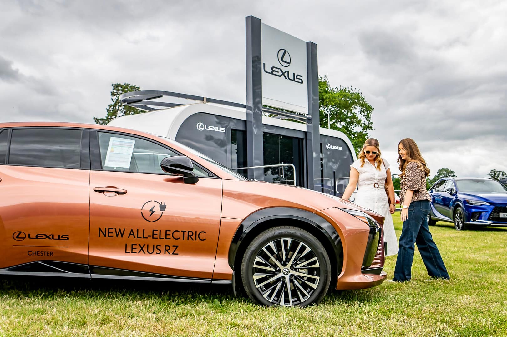 Ladies viewing car exhibits at Bolesworth International